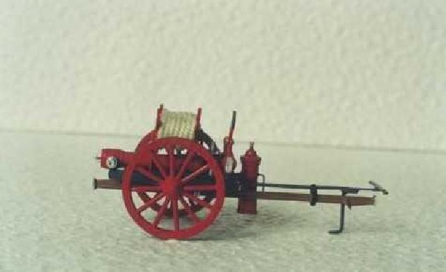 Hand-operated fire cart with original fire equipme
